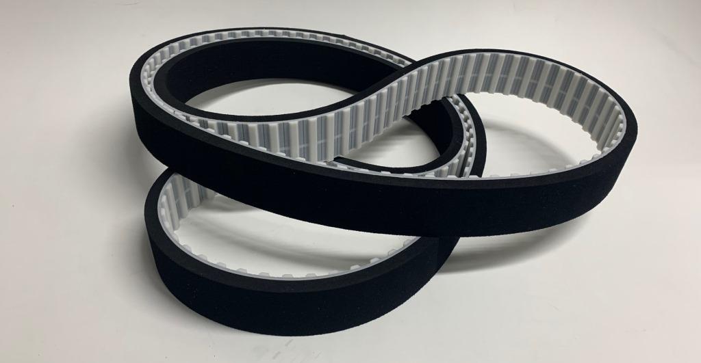 Timing belt with porol coating